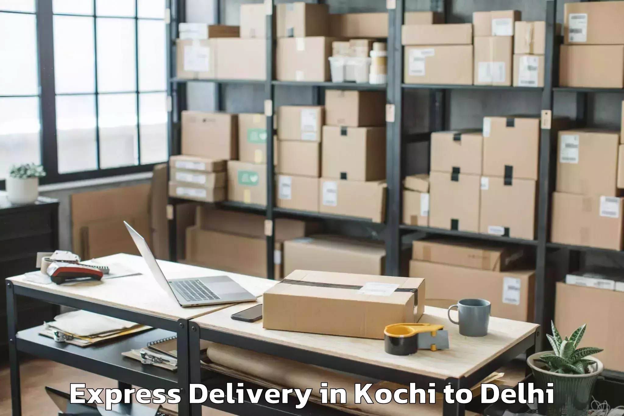 Top Kochi to Aggarwal City Mall Pitampura Express Delivery Available